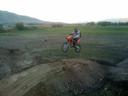 Sam at the Track Jumping Left2.jpg